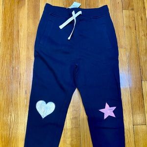 BNWT navy joggers. Knee appliqués.